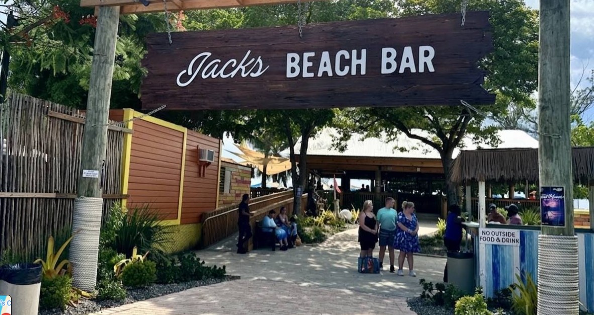 Jacks Beach Bar entrance sign on Seven Mile Beach, Grand Cayman